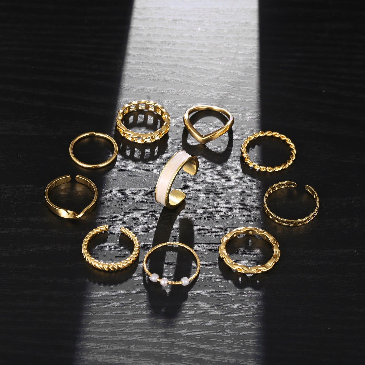 Set of 10 Gold-Toned Rings with Unique Designs