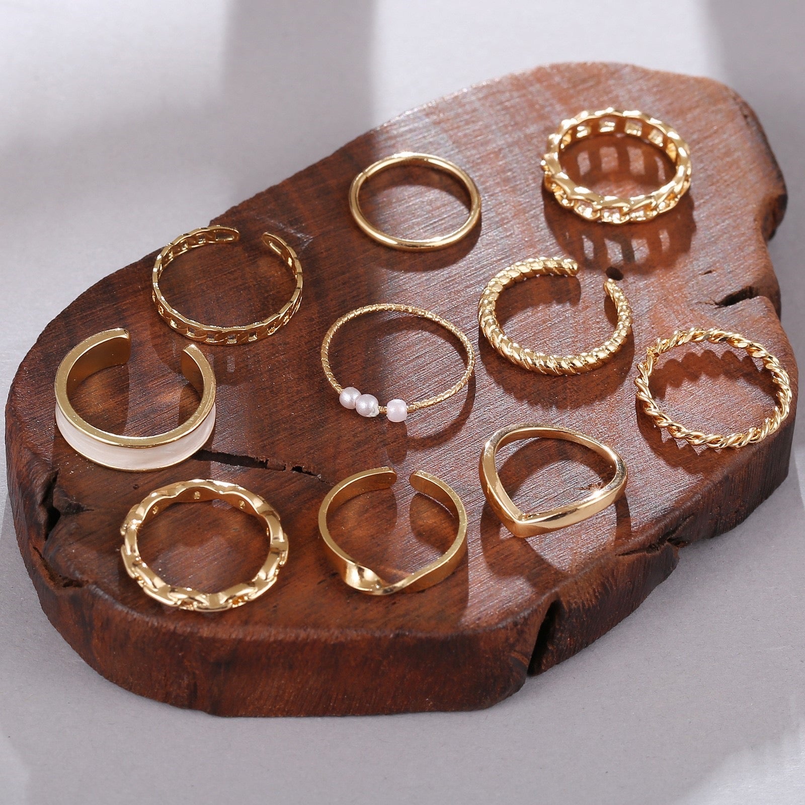 Set of 10 Gold-Toned Rings with Unique Designs