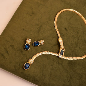 Elegant Gold-Toned Necklace and Matching Earrings Set with Blue Stone