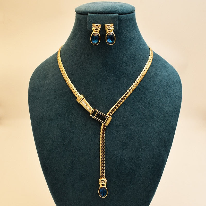 Elegant Gold-Toned Necklace and Matching Earrings Set with Blue Stone